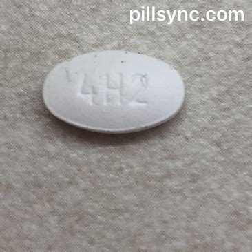 1 4 Loading. . Oval white pill 4h2